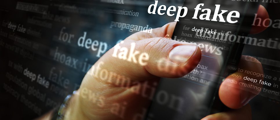 Computer animated image of hand holding phone. Words like deepfake in the foreground.
