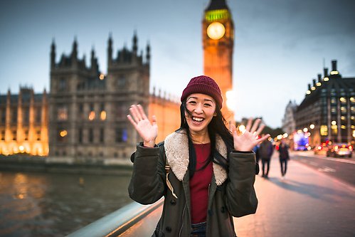 A happy woman in London.
